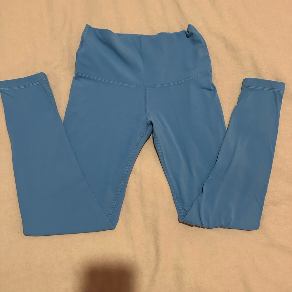 Aritzia TNA Action leggings in cerulean blue